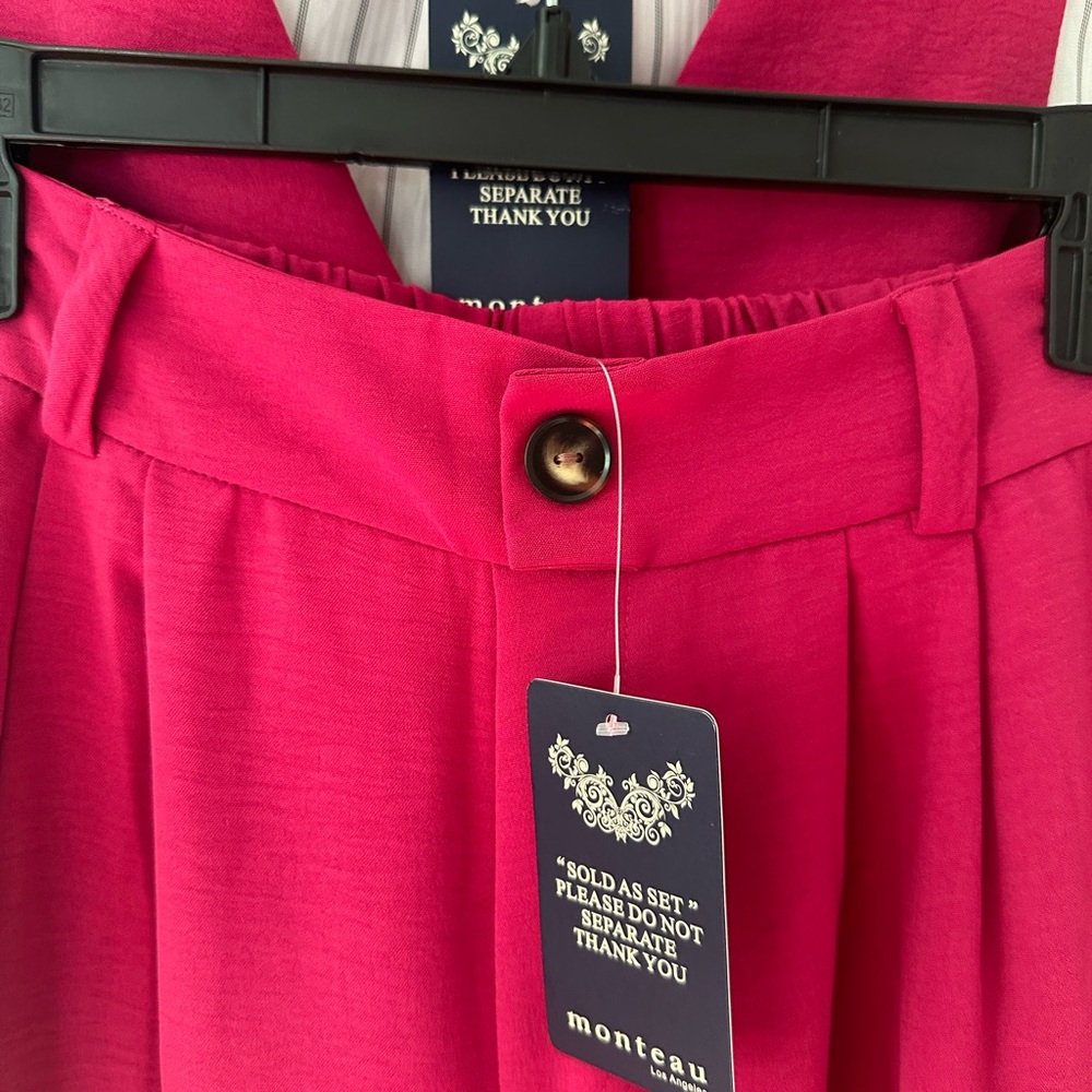 Fuchsia colored suit